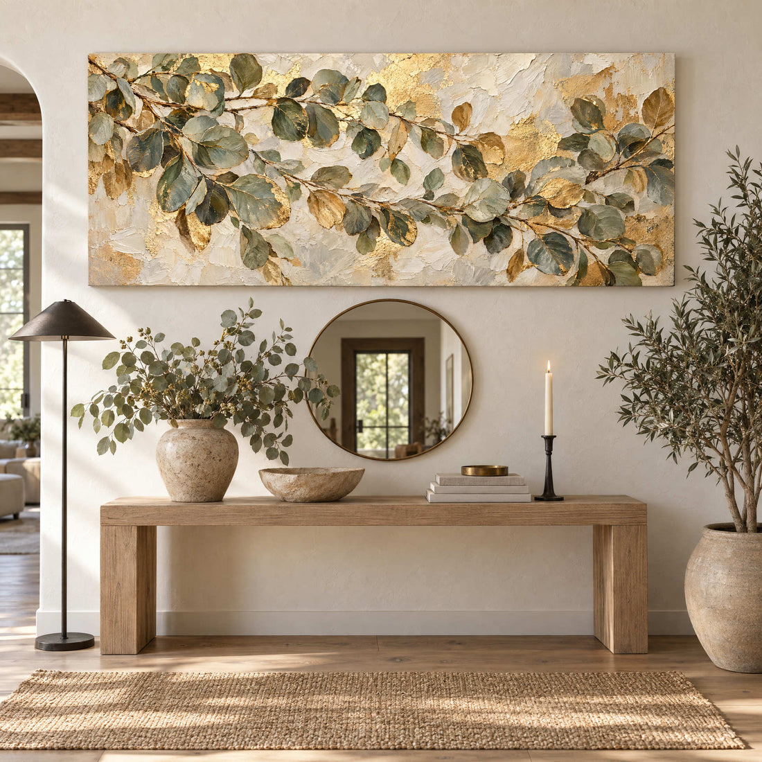 Eucalyptus canvas above a timber console in an organic entryway