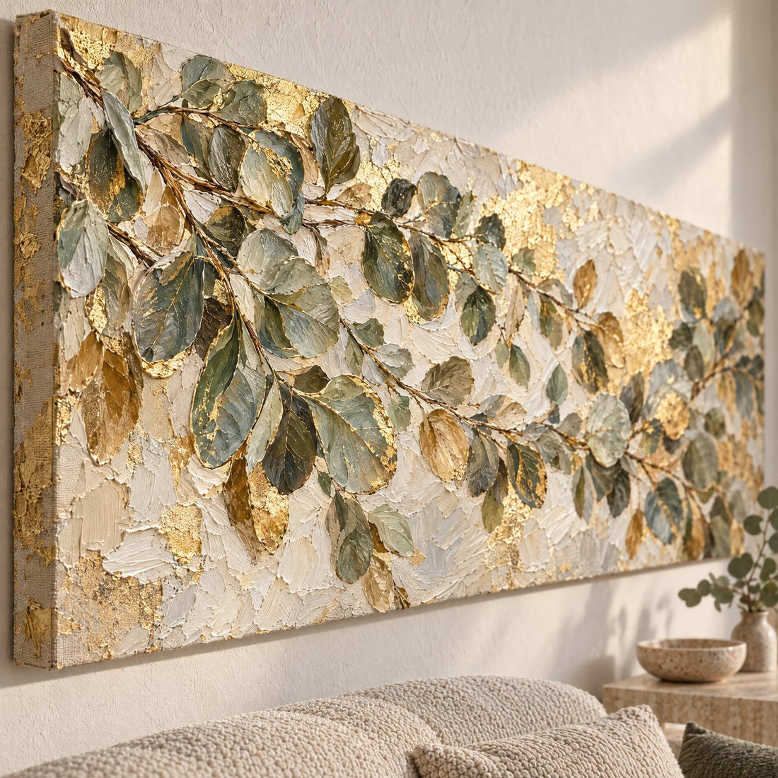 Close up of the carved eucalyptus leaves and the torn gold leaf behind them