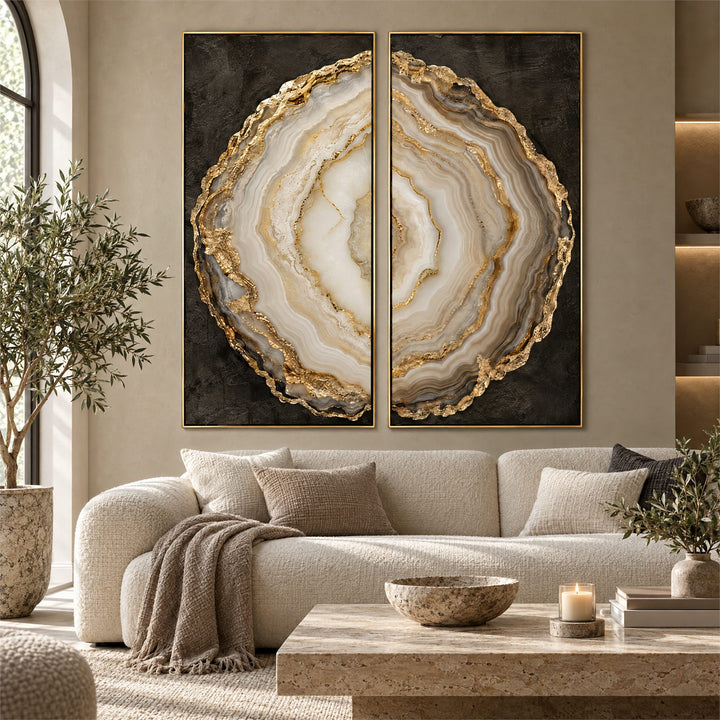 Two panel agate geode canvas set in cream, grey and gold above a boucle sofa