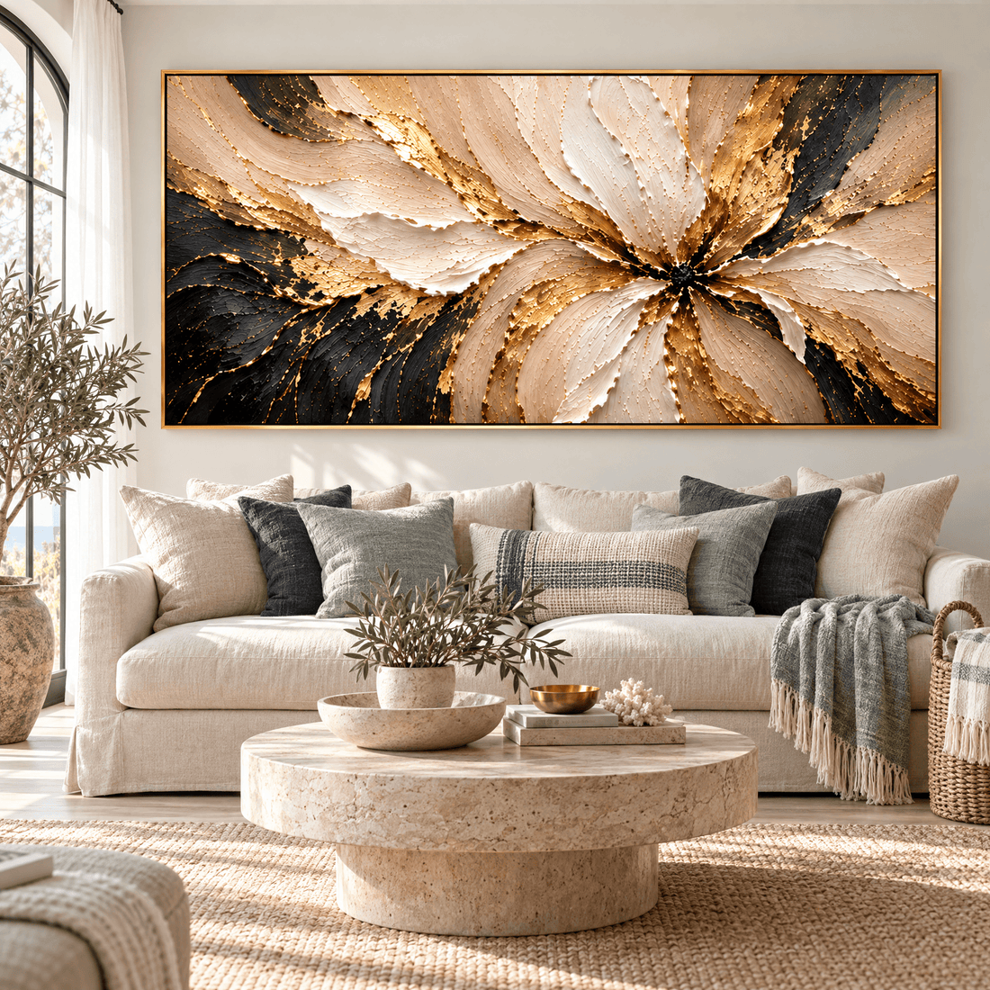 Luxury gold flower wall art hanging above a cream sofa in a coastal living room