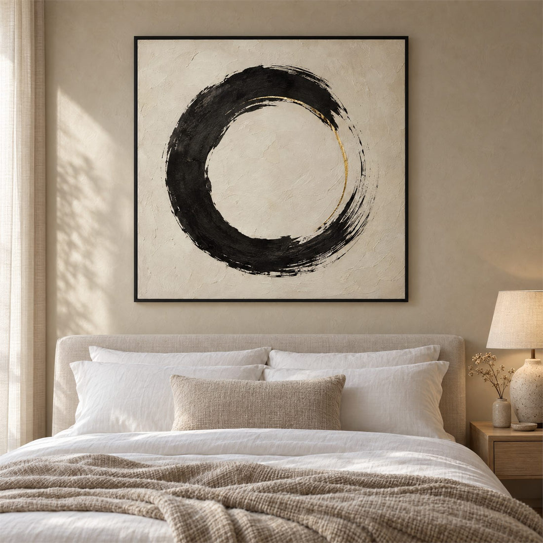 Enso circle canvas centred above a bed in a neutral bedroom