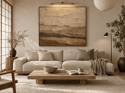 Terracotta and olive abstract landscape canvas above a linen sofa in a japandi living room