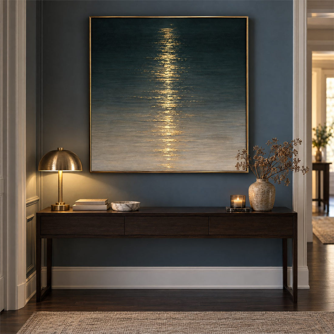Moonlit water canvas above a console table in an entryway