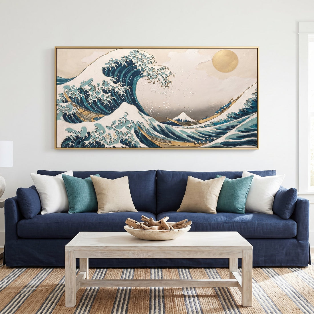 Gilded great wave panoramic wall art above a navy sofa