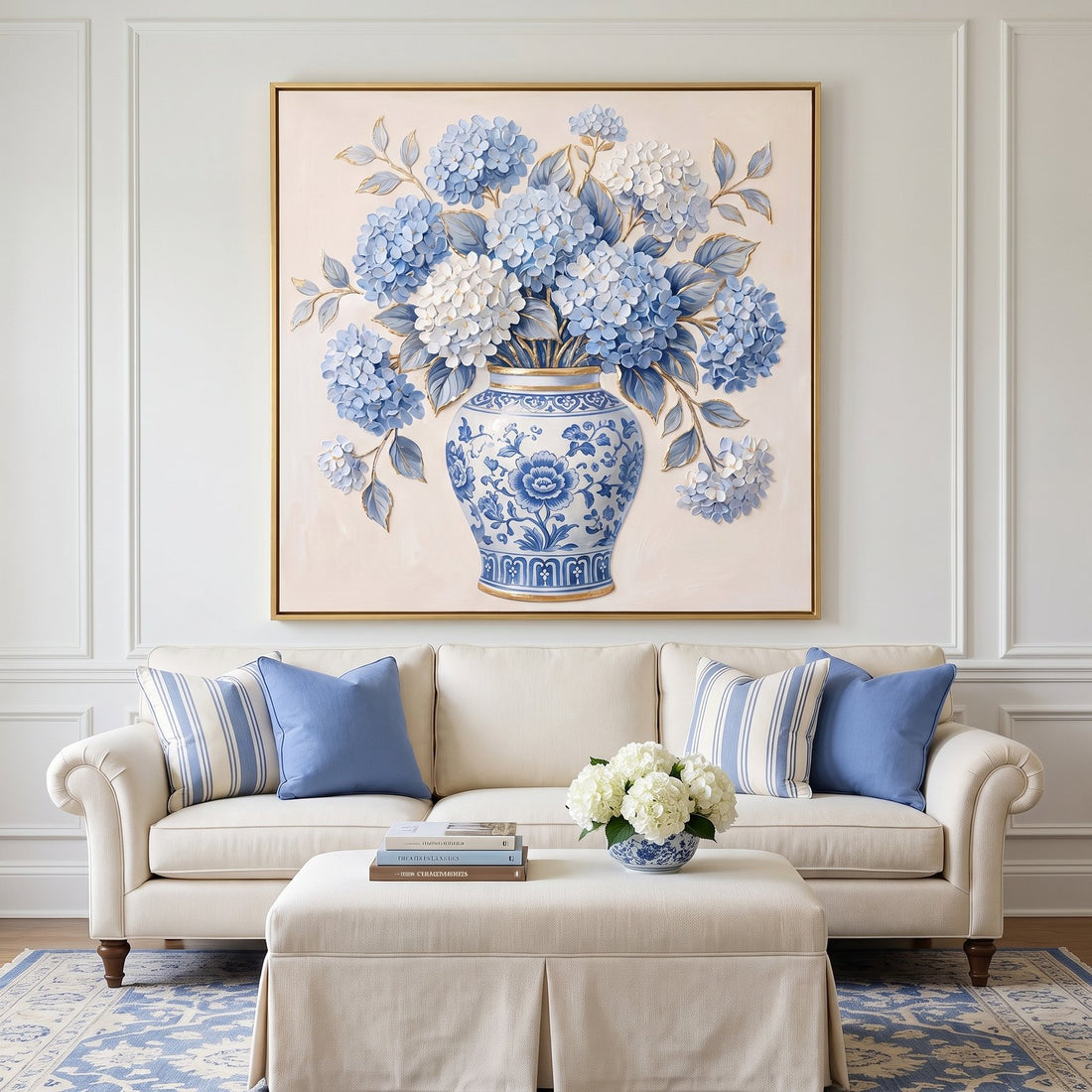 Blue and white ginger jar hydrangea wall art above a cream sofa