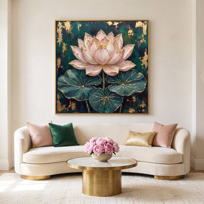 Blush pink lotus wall art with emerald lily pads above a curved ivory sofa