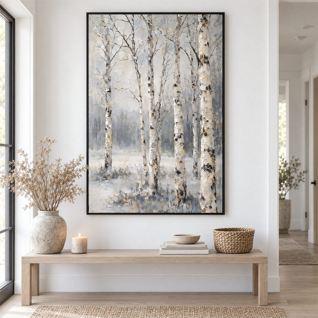 Tall birch tree canvas above a console table in an entryway