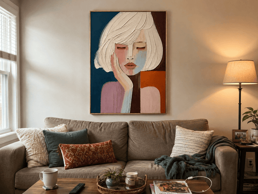 Jasmin P. at home with her Quiet Reverie canvas hanging above the sofa