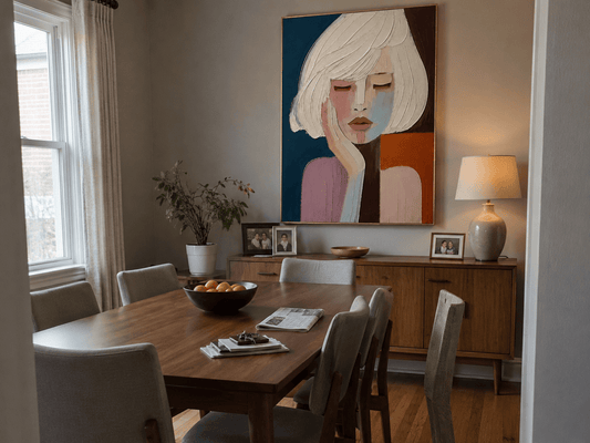Paul and Julie F. at home with their Quiet Reverie canvas hanging in the dining room