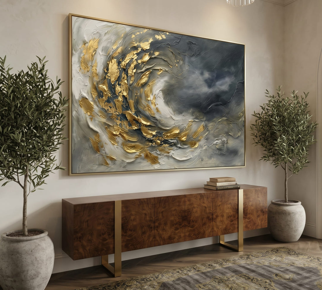 Oversized gold swirl canvas above a burl walnut sideboard in an entryway