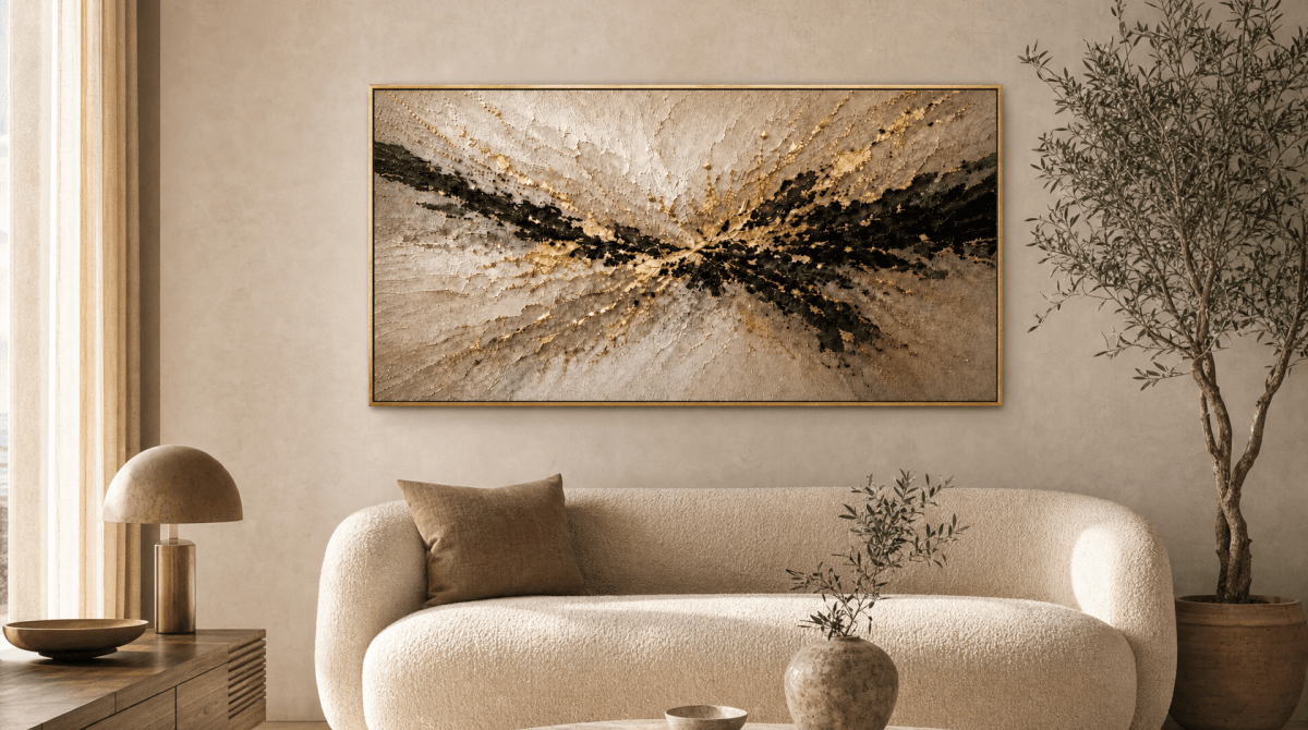 Gilded Burst hand painted canvas above a cream sofa in a warm neutral living room