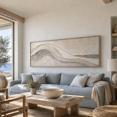 Panoramic sculpted wave canvas above a pale blue sofa