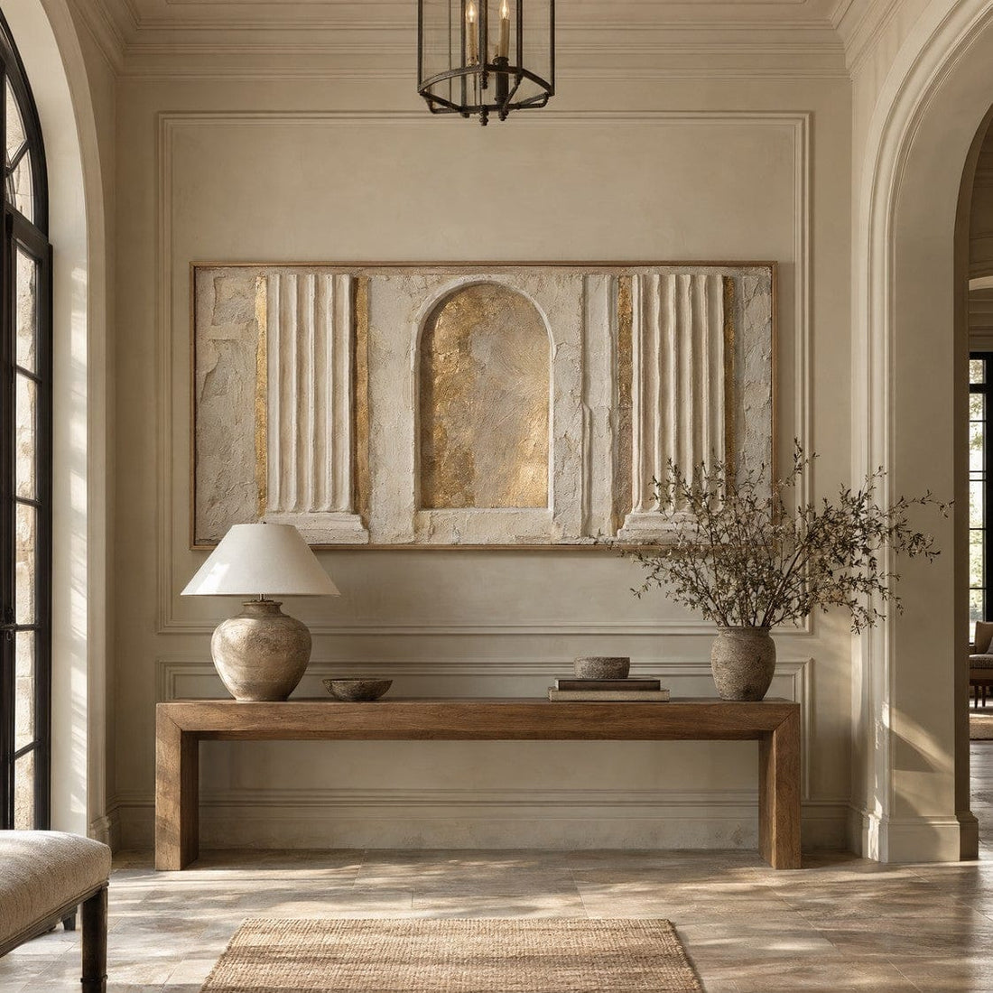 Panoramic column and arch relief canvas above a console in an entryway