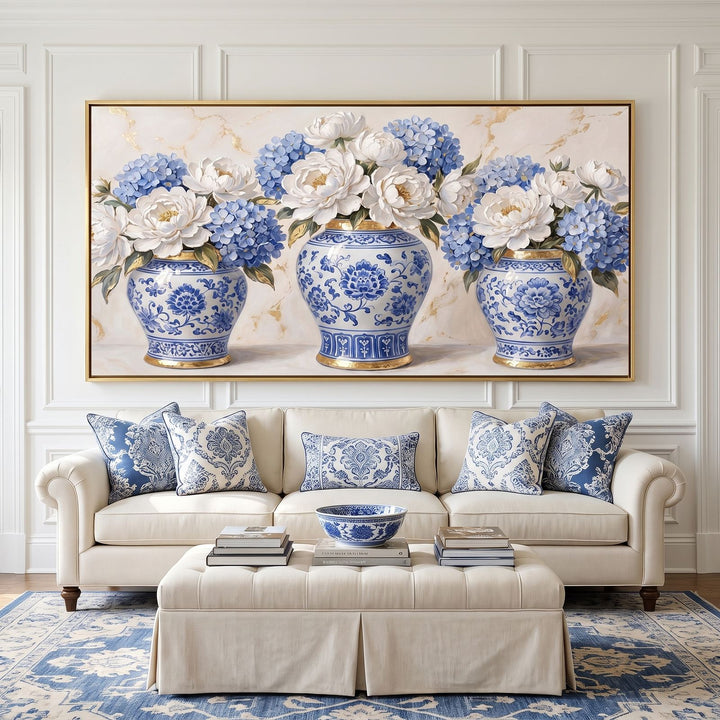 Panoramic blue and white ginger jar wall art above a cream sofa