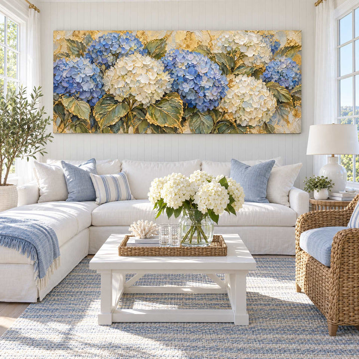 Blue and white hydrangea panoramic canvas above a sofa in a Hamptons sunroom