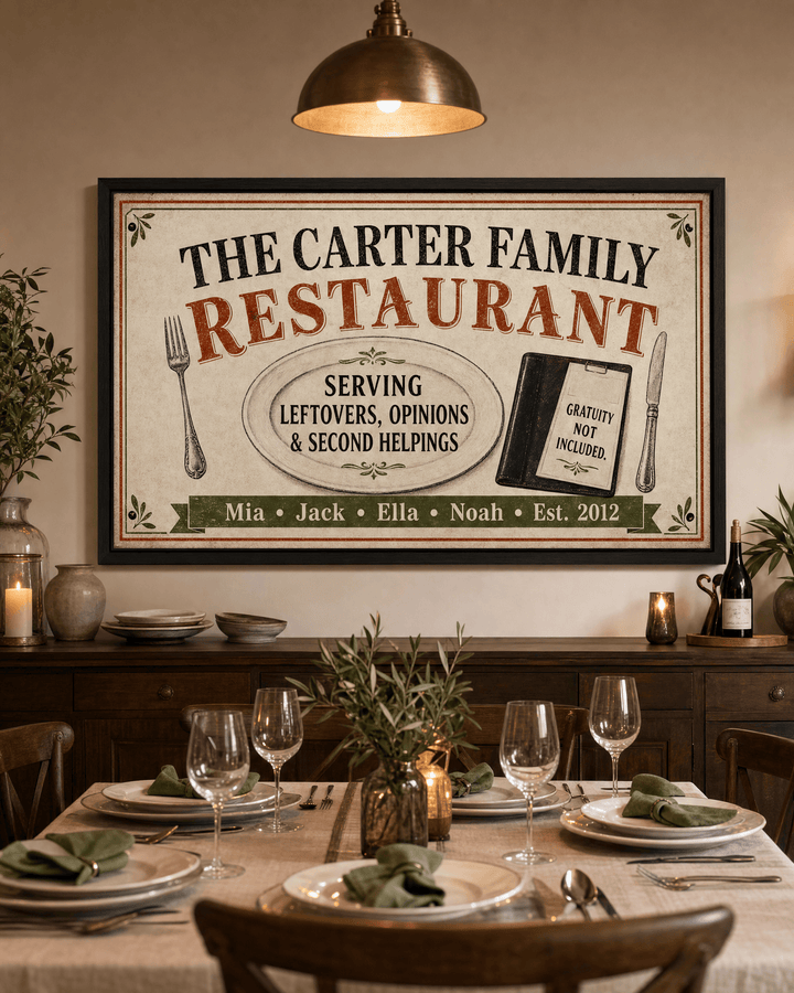 Personalized family restaurant sign canvas with vintage platter, cutlery and menu folder, hung above a dining room sideboard