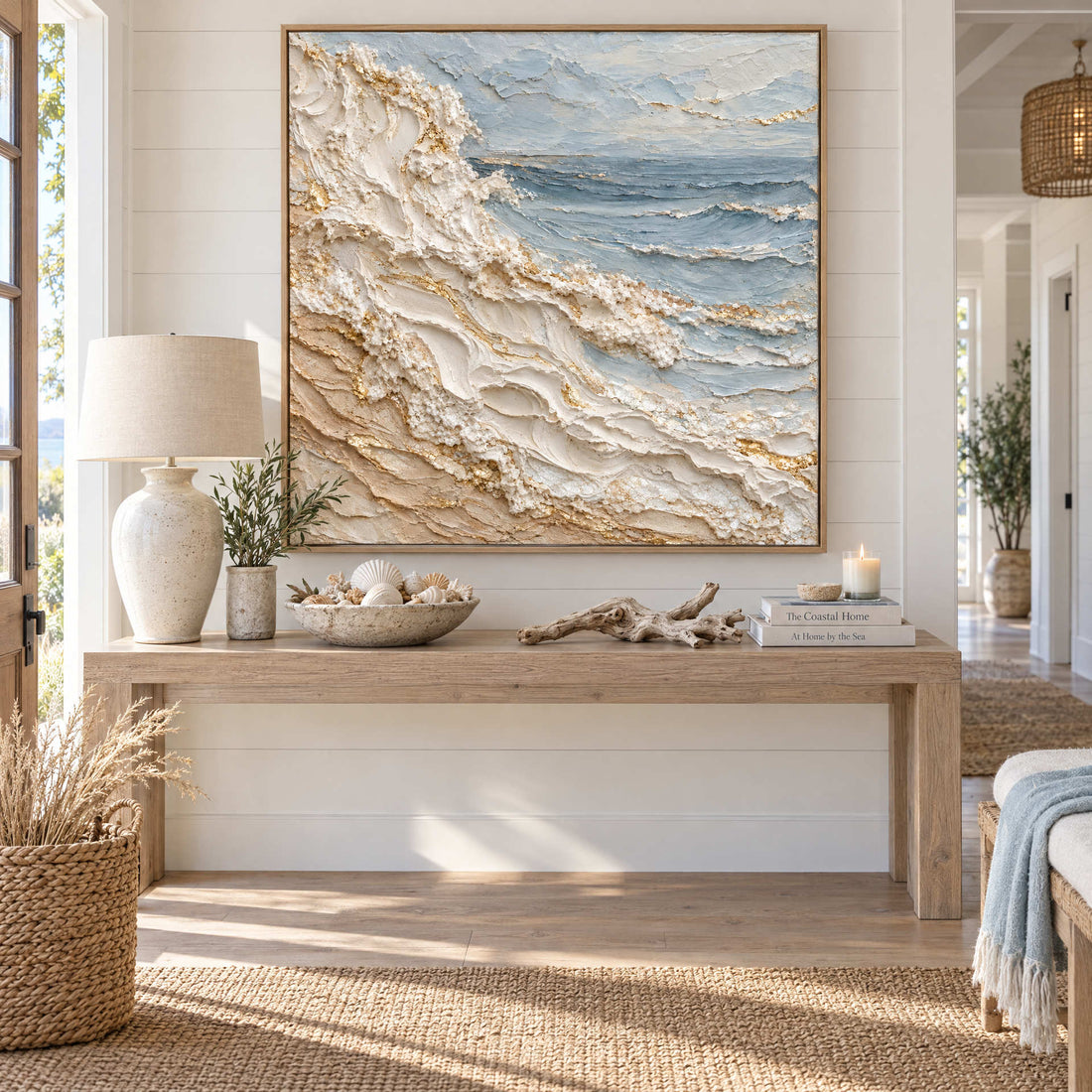White and gold wave canvas above a console in a shiplap entryway