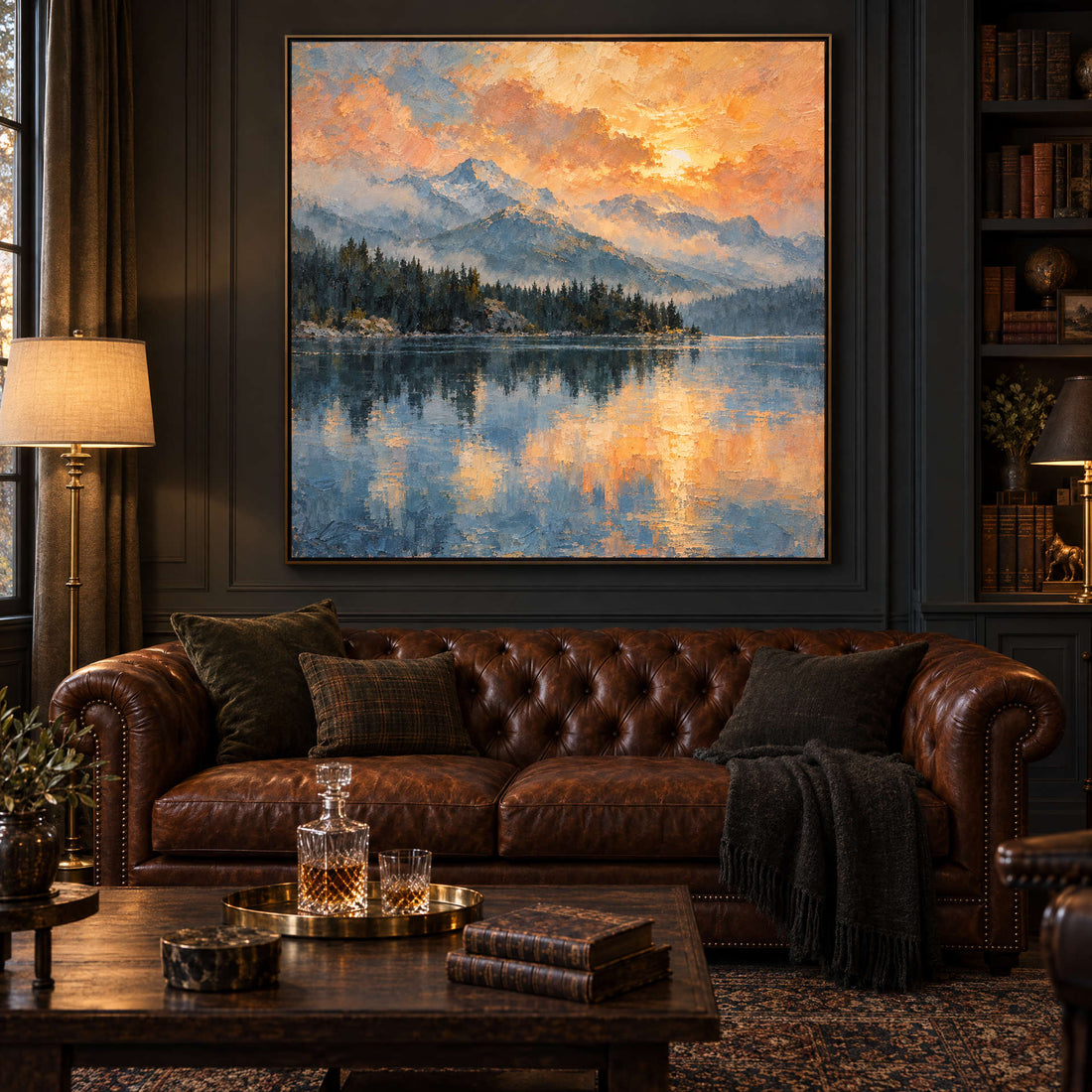 Sunset lake canvas above a leather chesterfield in a dark panelled study
